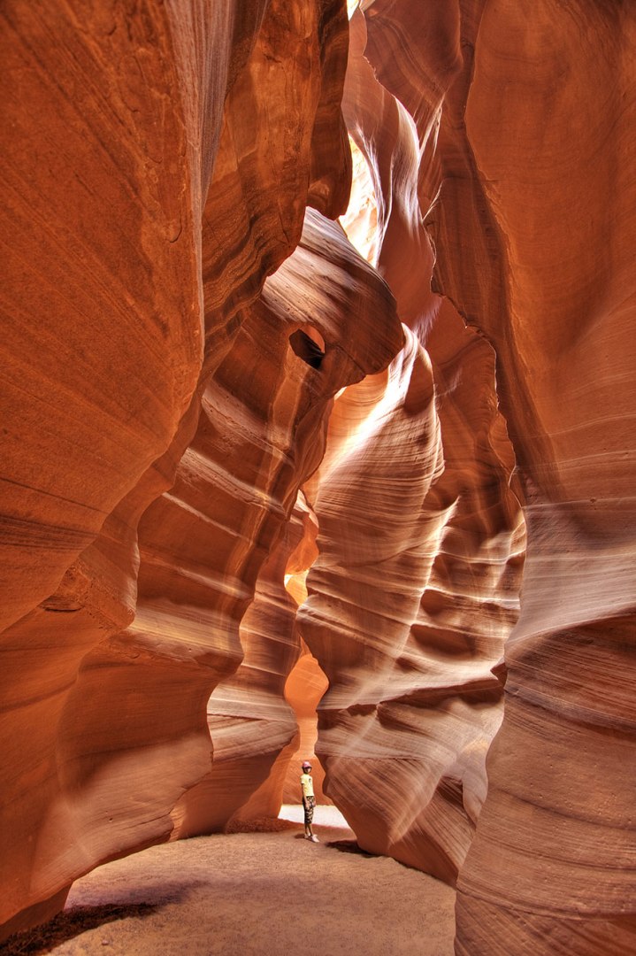Antelope Canyon is the most-visited and most-photographed slot canyon in the American Southwest. It is located on Navajo land near Page, Arizona. Antelope Canyon includes two separate, photogenic slot canyon sections, referred to individually as Upper Antelope Canyon or The Crack; and Lower Antelope Canyon or The Corkscrew 